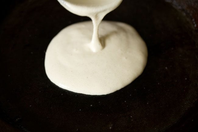 pouring batter with a ladle. 