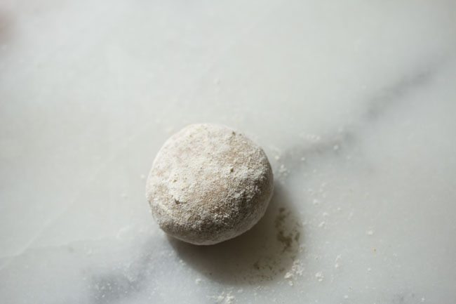dough ball sprinkled with some flour. 