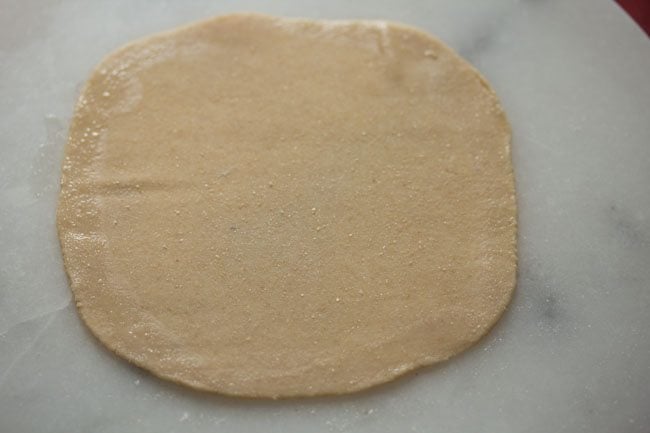 water applied at the edges of the rolled dough. 