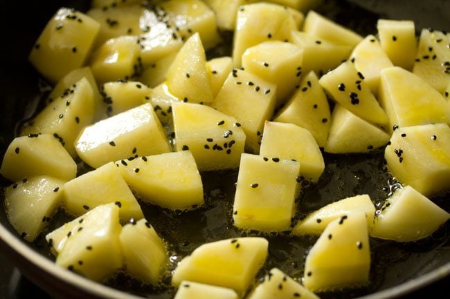 potatoes mixed with the nigella seeds and oil. 