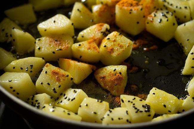 turmeric powder sprinkled on the potatoes. 