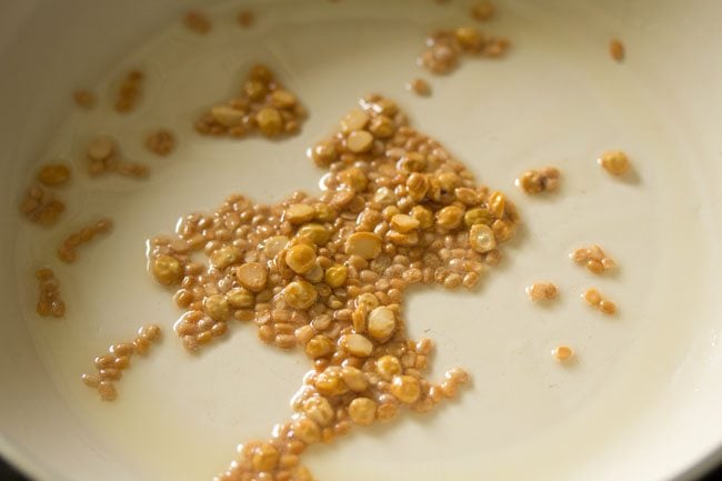 golden sauteed lentils in the pan