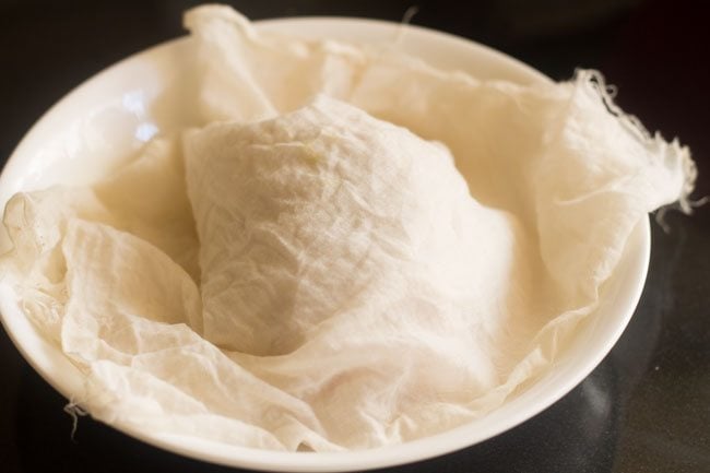 dough covered with a damp cloth. 