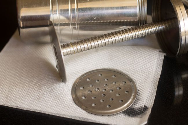 greased discs and chakli moulds.