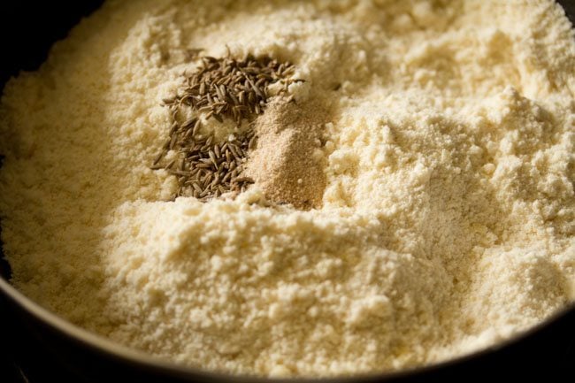 cumin seeds and asafoetida added to the flour mixture.