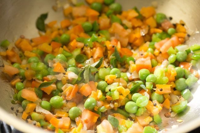 curry leaves added to the vegetable mixture. 