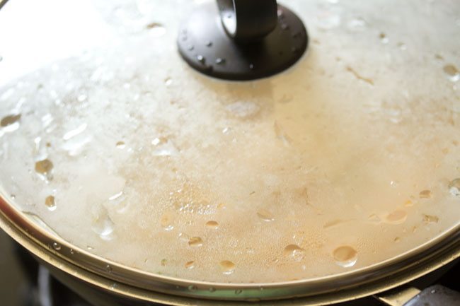 cooking khara bath in the covered pan. 