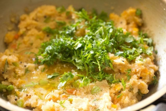 chopped coriander leaves added to khara bath. 