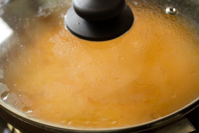 cooking kesari bath in the covered pan. 