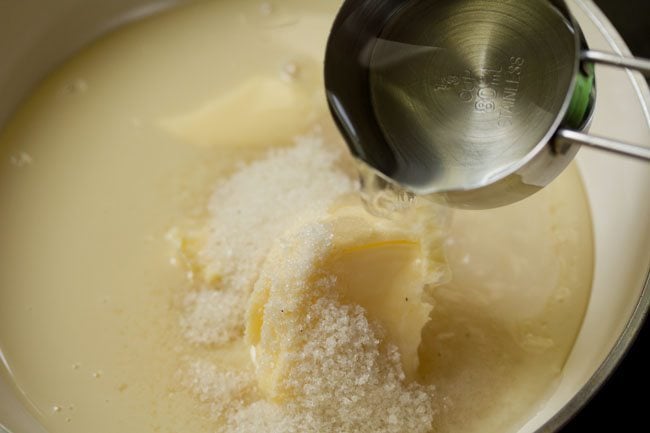salted butter, sugar, water and condensed milk in a pan