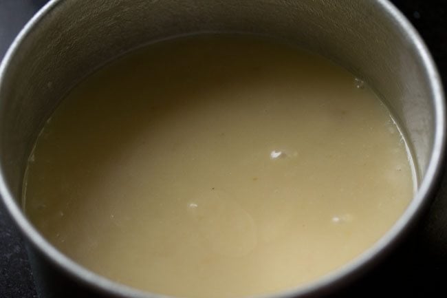 cooker cake batter in baking pan