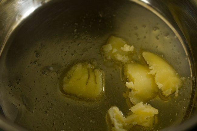 heating ghee in a pan. 