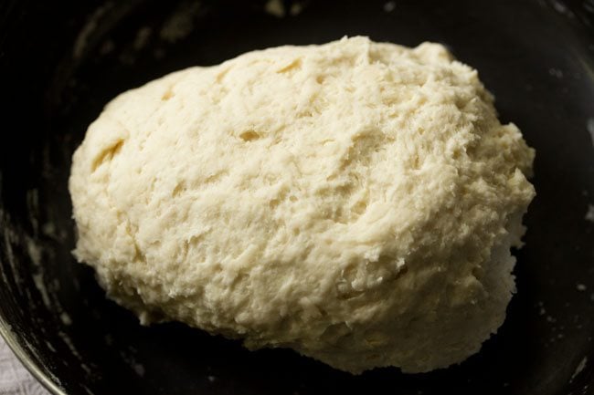 kneading pizza dough