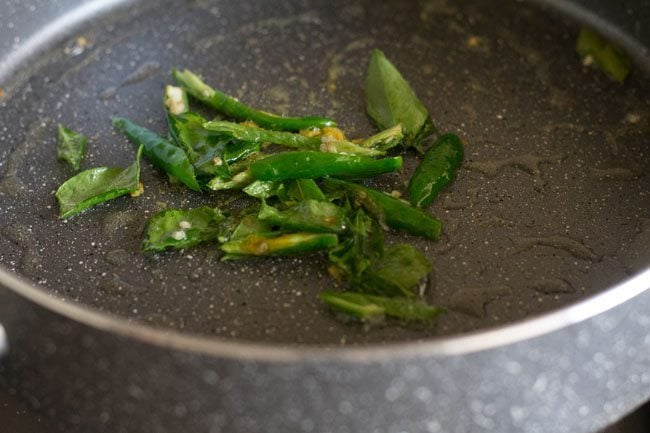 sautéing spices and herbs in pan