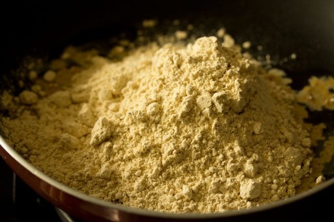 sattu flour added to the hot ghee. 