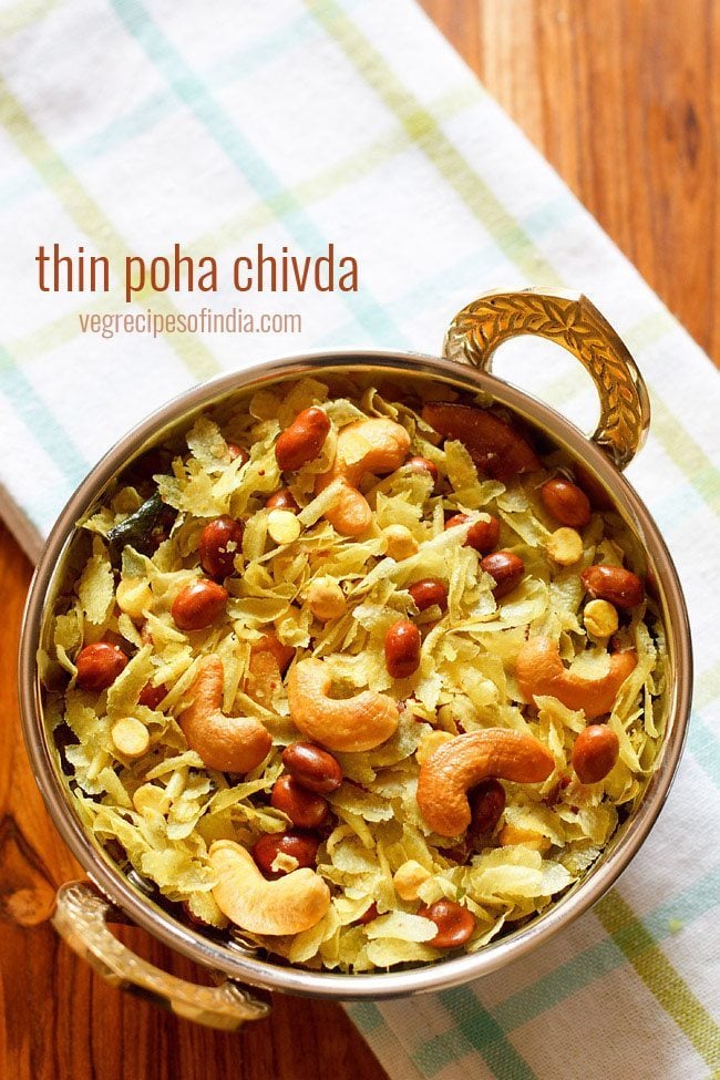 poha chivda in a metal bowl