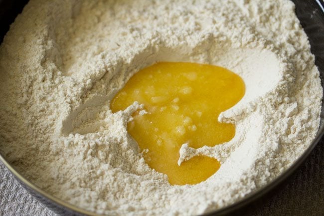 ghee added to the flour mixture for urad dal kachori. 