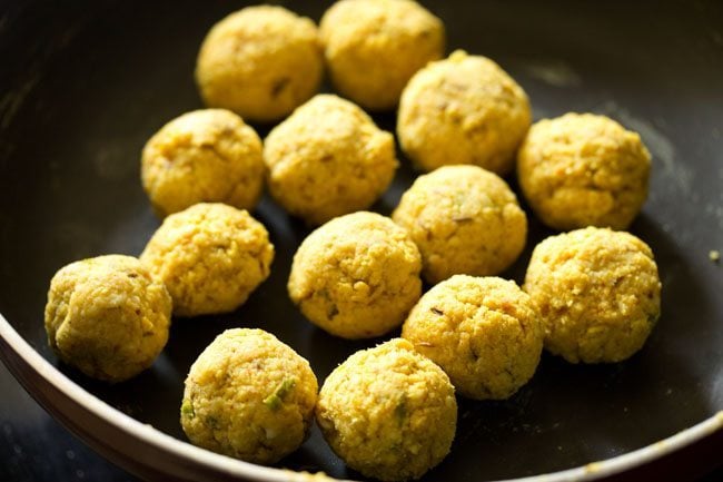 small balls made from cooked urad dal mixture. 