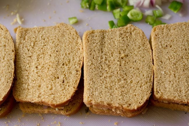 Covered with the remaining bread slices