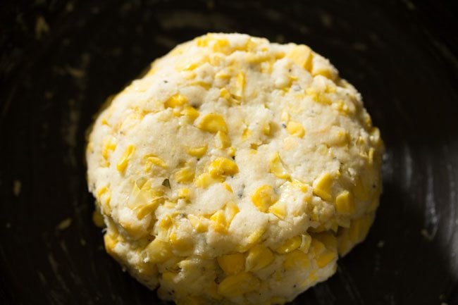 cheese corn ball mixture in bowl.