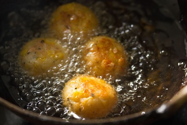 frying cheese corn balls.