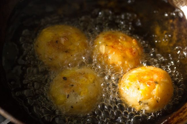 frying cheese corn balls.