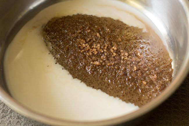 taking milk and brown sugar in a pan