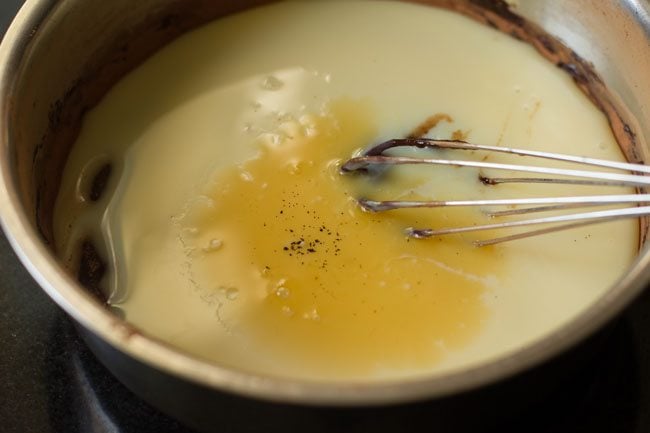 adding vanilla extract to chocolate mixture 