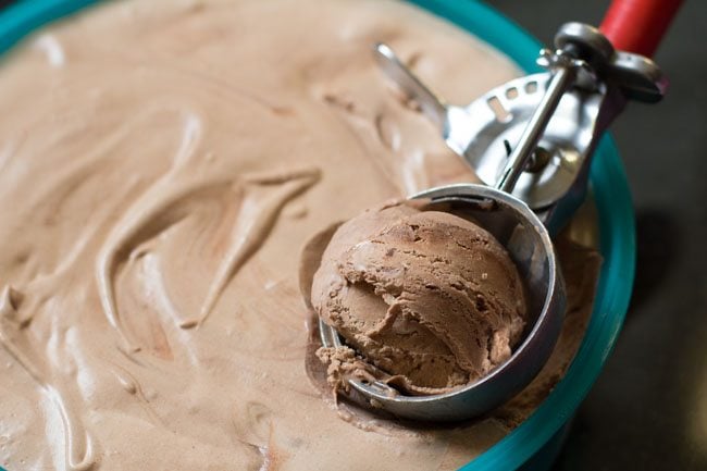 scooping out set chocolate ice cream 