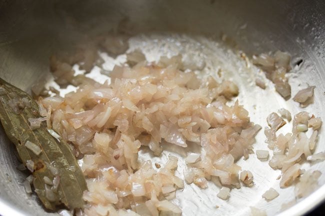 finely chopped onions being sautéed 