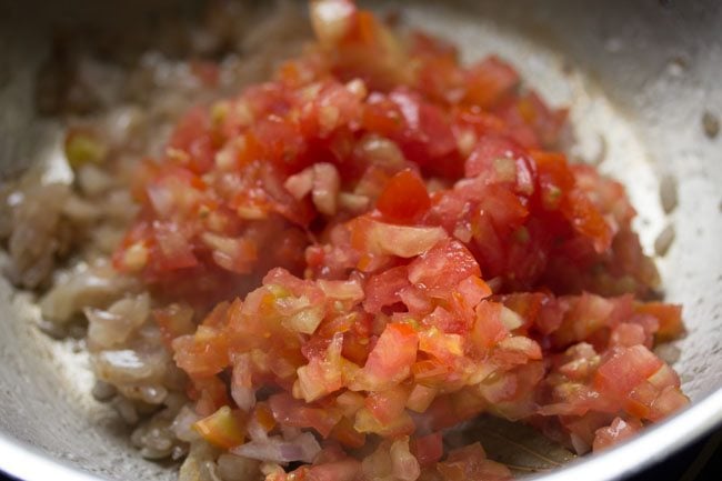 finely chopped tomatoes in the pan