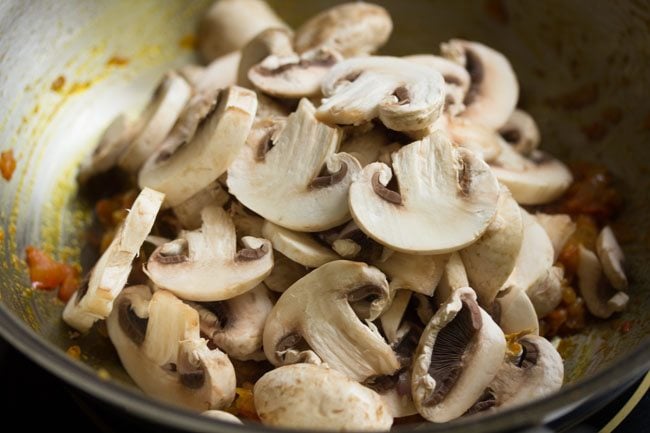 button mushrooms in the pan