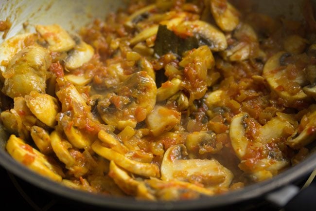 moist mushrooms being sautéed in the pan