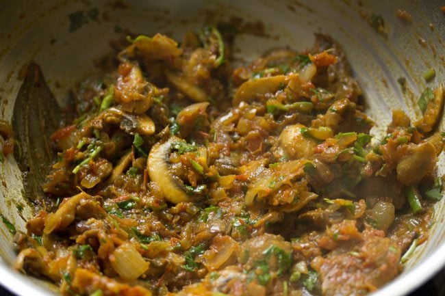spices and herbs mixed with the mushroom do pyaaza