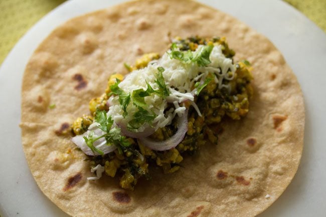 coriander added to cheese