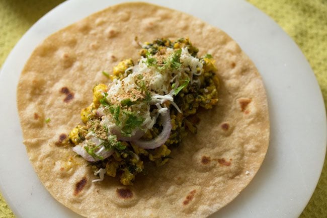 roti topped with chaat masala powder and lemon juice