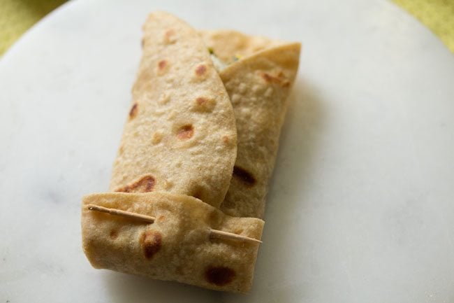 roll the spinach wraps and secure with a toothpick