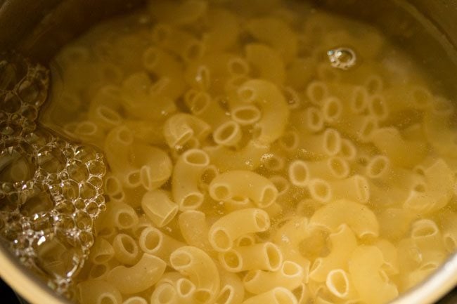 pasta added to boiling water. 