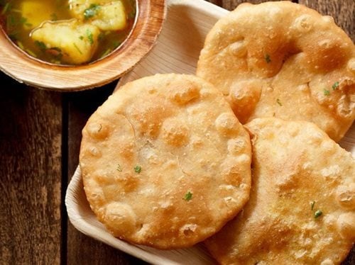 urad dal kachori on a square tray.