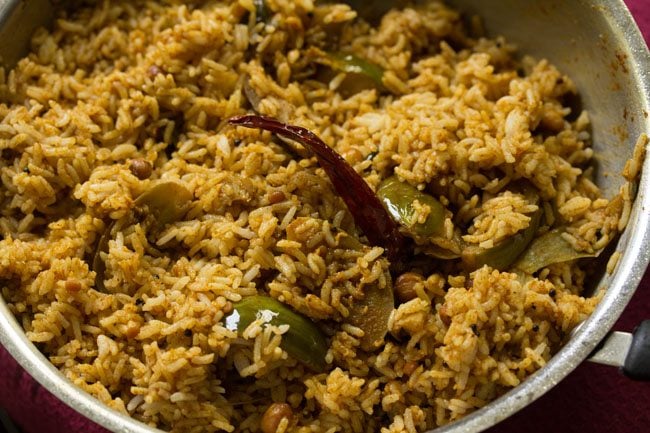 cooked rice mixed evenly with the brinjal masala. 