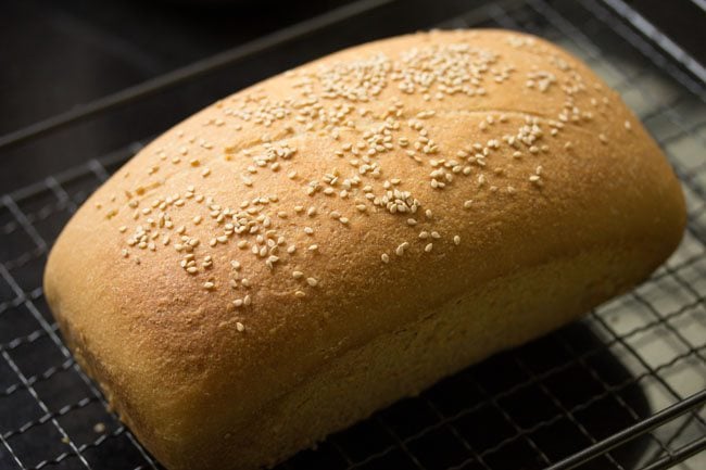 baked sandwich bread on a cooling rack. 