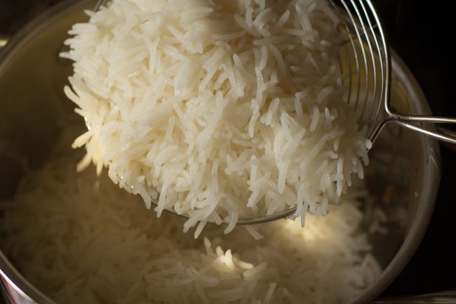 layering rice over veggies