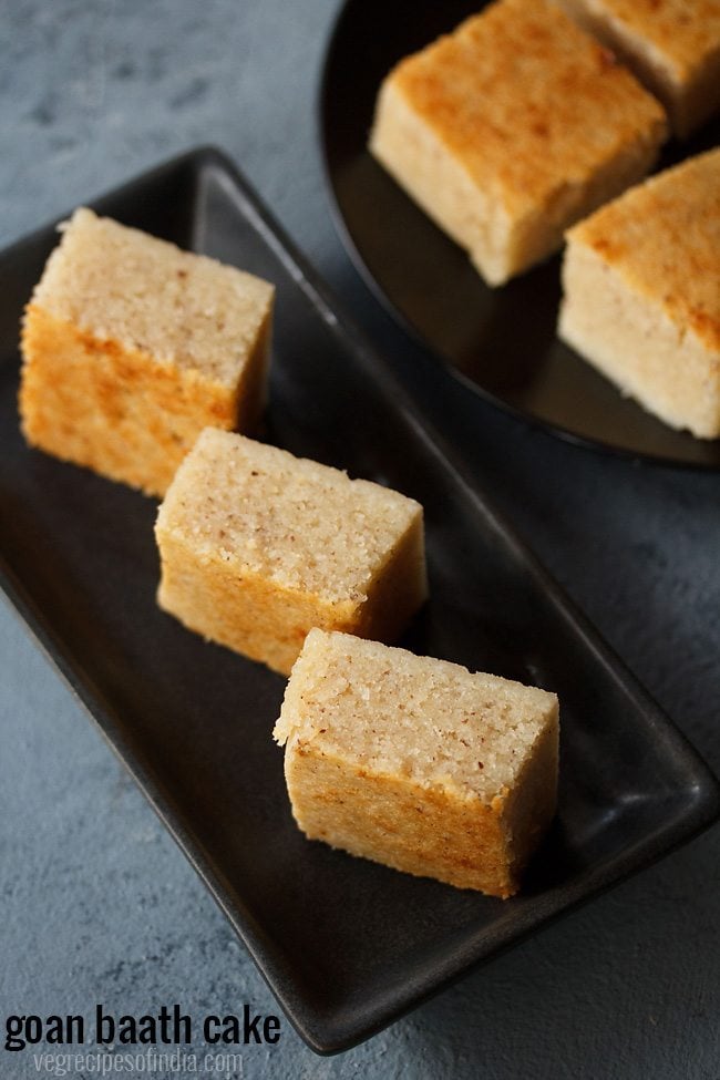 rava cake served in black plate