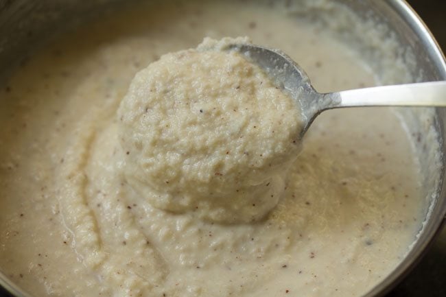 batter consistency shown with a spoon