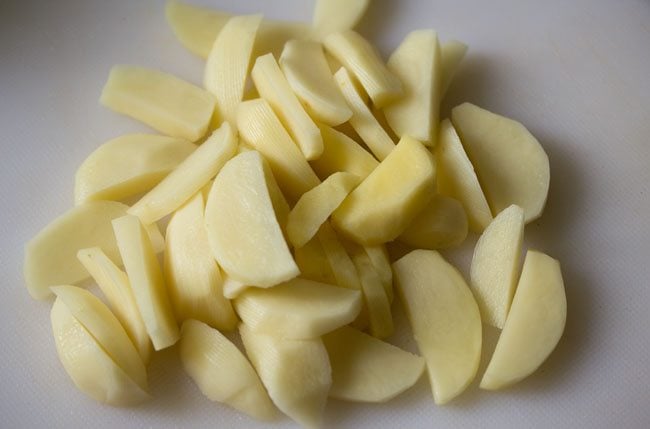 potatoes chopped into wedged shapes