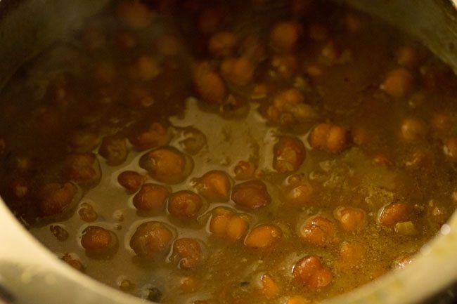 once the gravy has thickened to a medium consistency, add ½ teaspoon garam masala powder.