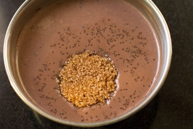 adding brown sugar to the chocolate mixture 