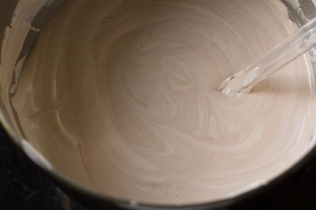 folding the chocolate mixture in the whipped cream