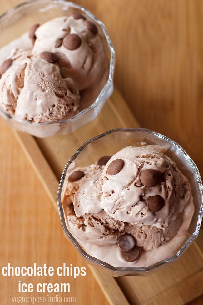 chocolate chip ice cream scoops topped with chocolate chips served in glass bowls