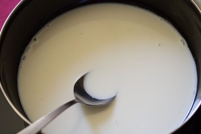 milk in a black bowl